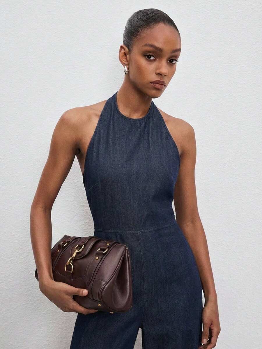 ATUI Studio Women's Casual Sexy Backless Halter Neck Denim Jumpsuit With Side Pockets, Suitable For Summer Vacation - Navy Blue - View 1