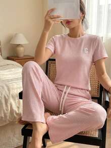 Conjunto casual de dos piezas acanalado: camiseta manga corta y pantalón amplio con cordón, Conjunto loungewear acanalado negro: camiseta relaxed fit y pantalón wide leg, Set cómodo acanalado 2 piezas: top básico + pantalón holgado con cintura ajustable - Rosa - Ver 2