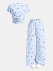 Bộ đồ 2 mảnh dễ thương kiểu retro cho bé gái, gồm áo thun ngắn tay và quần legging kẻ sọc xanh dương in hình nơ, thích hợp mặc hàng ngày. - Nhiều màu - Xem 5