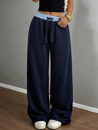 SHEIN 少女休闲宽松运动裤，松紧腰，阔腿设计，撞色拼接，适合春、夏、秋、冬四季穿着，也是开学季的理想选择。