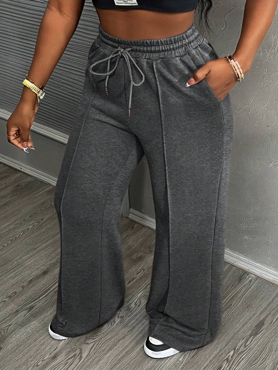 Slaydiva Pantalones deportivos casuales para mujer con bolsillos en diagonal y cintura con cordón