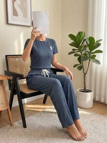Conjunto casual de dos piezas acanalado: camiseta manga corta y pantalón amplio con cordón, Conjunto loungewear acanalado negro: camiseta relaxed fit y pantalón wide leg, Set cómodo acanalado 2 piezas: top básico + pantalón holgado con cintura ajustable - Azul - Ver 2