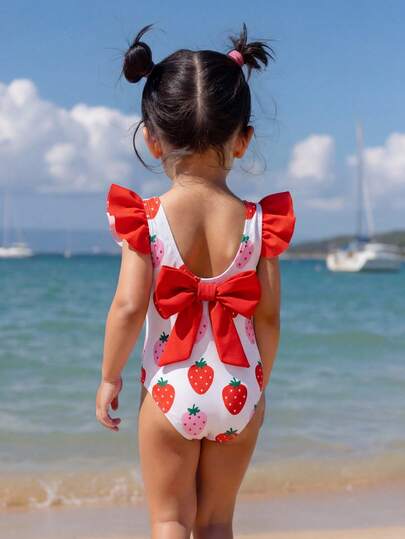 Đồ bơi đi biển dễ thương, phối màu nơ và họa tiết gấu hoạt hình dành cho bé gái