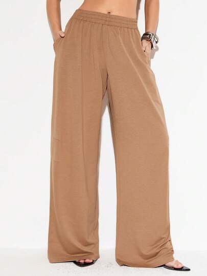 Femmeiva Pantalones deportivos casuales de mujer de unicolor con cintura elástica y bolsillo en diagonal