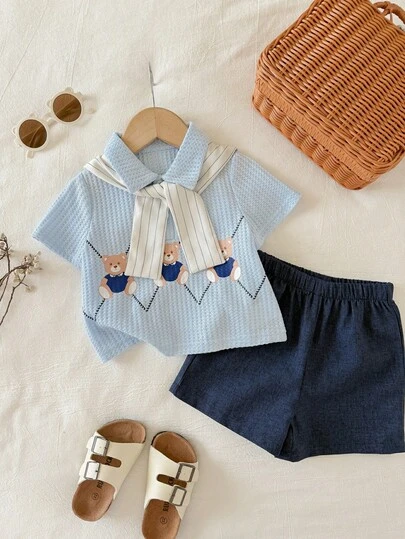 SHEIN 3pcs Baby Boy Summer Casual Bear Graphic Polo Shirt, Striped Shawl, Blue Shorts Pants Gentleman Outfit Set, Suitable For Birthday Party, Rave, Evening Party, Performance, Wedding, Full Moon, Christening And 1st Birthday Celebration, Wedding Guest, Baby Shower Christening
