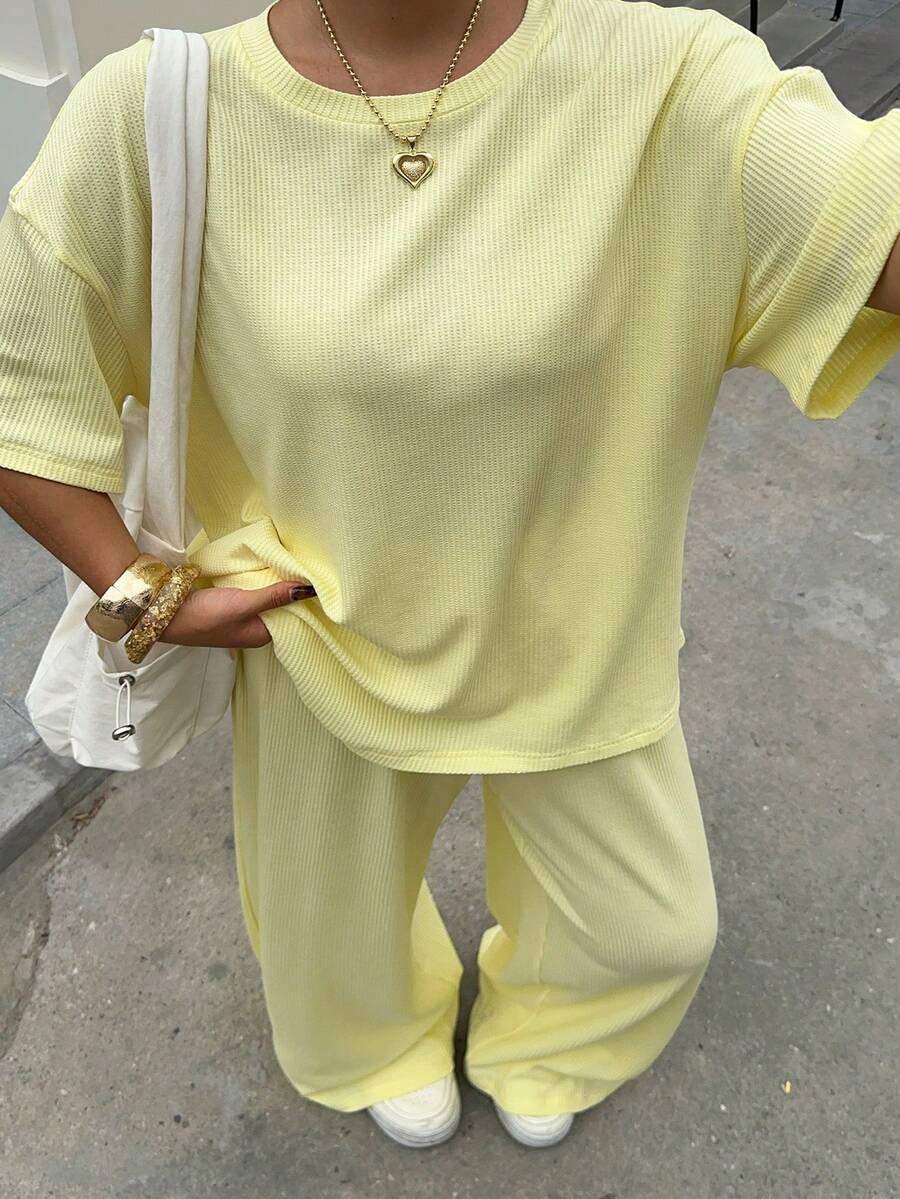 Muchica Plus Size Women's Solid Color Round Neck Short Sleeve T-Shirt And Casual Pants 2-Piece Set - Pale Yellow - View 1