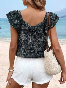 Sylviya 女士休闲碎花蝴蝶结后背荷叶边短袖上衣，适合春夏日常外出和度假穿着。夏季女式上衣，夏季女式上衣，度假女式上衣，夏季可爱碎花夏季上衣，休闲夏季上衣 - 黑色 - 查看 4