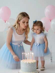 Glamorique Kids Đầm dự tiệc mùa xuân/hè mới cho bé gái, chất liệu satin trơn phối lưới tương phản, nơ 3D, tay áo xòe, chất liệu voan. - Màu xanh lam - Xem 8