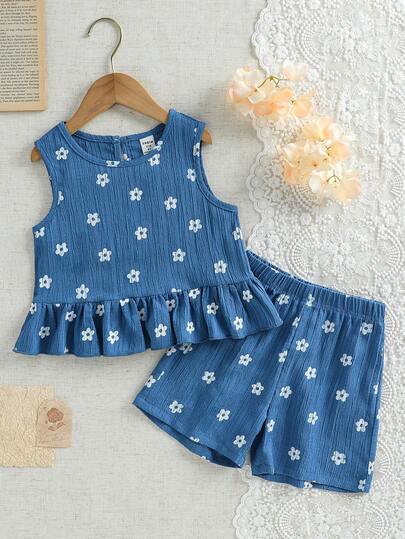 SHEIN Bộ đồ 2 món cho bé gái: Áo không tay in hoa và quần short rộng, kiểu dáng ngọt ngào và dễ thương, thanh lịch và tươi tắn, thích hợp mặc hàng ngày, đi nghỉ mát và dã ngoại.