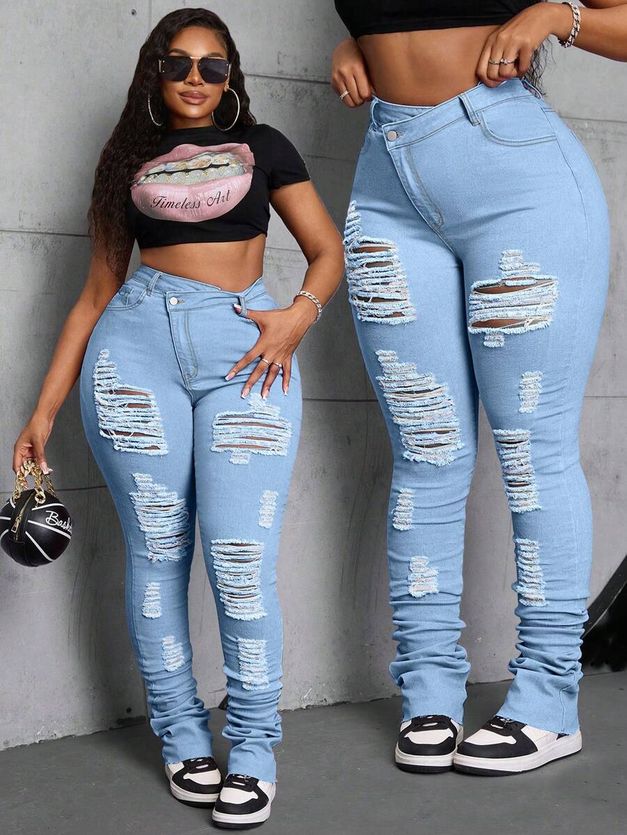 Slaydiva Jeans asimétricos con puños elásticos y desgastados en color rosa para mujer de talla grande - Lavado ligero - Ver 1