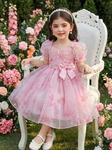 Glamorique Kids Đầm dự tiệc cho bé gái, màu hồng in hoa, tay áo cánh hoa và nơ trang trí phía sau, kiểu đầm công chúa. - Hồng - Xem 1