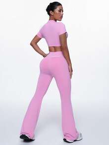 Dewbera Bộ đồ thể thao tập luyện 2 món cổ tròn tay ngắn viền màu tương phản và quần dài ống rộng cho nữ - Hồng - Xem 2