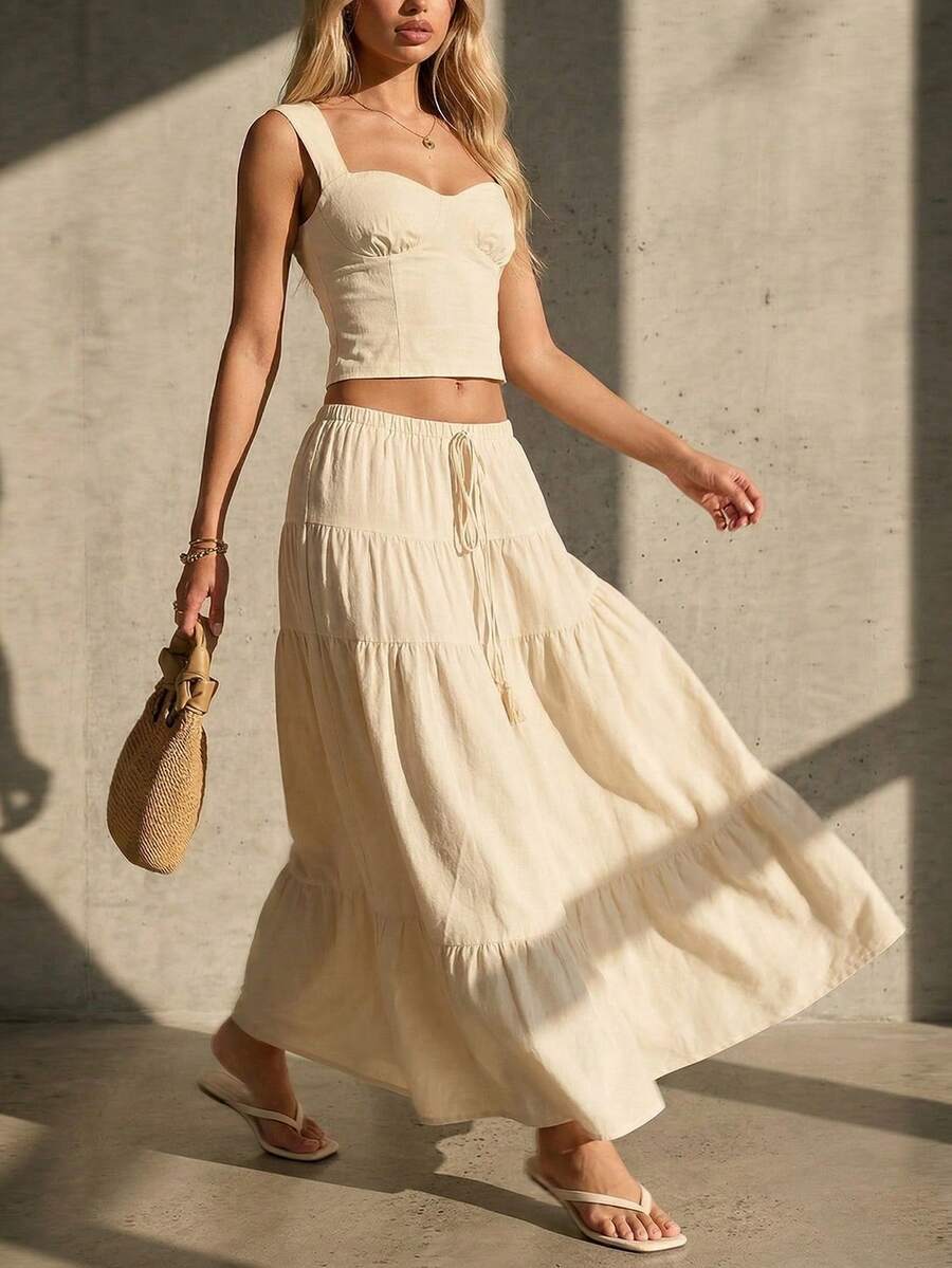 SHEIN Glamour Bộ đồ nữ thanh lịch, gợi cảm gồm áo hai dây màu vàng nhạt và chân váy xếp tầng lãng mạn, thích hợp cho kỳ nghỉ, dạo phố, hẹn hò và du lịch. - Màu be - Xem 1