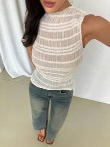 Firerie Áo sơ mi nữ thanh lịch, tối giản, thích hợp mặc hàng ngày, đi làm, dã ngoại, màu vàng mơ, không tay, cổ tàu, chất liệu vải dệt họa tiết, có đường cắt xẻ, thích hợp cho kỳ nghỉ biển, trang phục giáo viên, áo đi nghỉ mát. - Màu be - Xem 1