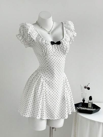 Elamini Đầm ngắn dễ thương chấm bi phối họa tiết, tay áo xếp ly, eo thắt nơ, kiểu dáng cánh hoa dành cho nữ.