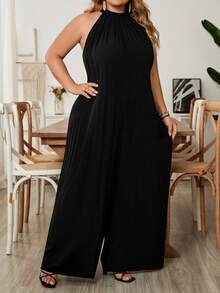 SHEIN CURVE+ Mono de talla grande para playa, nuevo para primavera y verano, de ocio y vacaciones, para uso diario, con cuello halter, cuello redondo, sin mangas, ultra holgado, pantalón de pierna ancha y talla extra - Negro - Ver 5