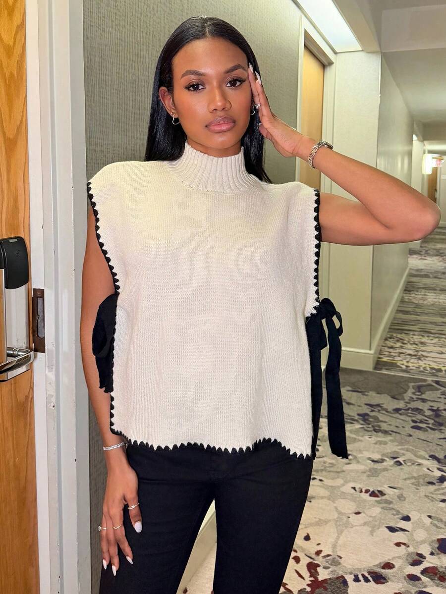 Natali Santanap Áo vest dệt kim cổ đứng xẻ tà viền tương phản dành cho nữ vào mùa thu/đông - Màu be - Xem 1