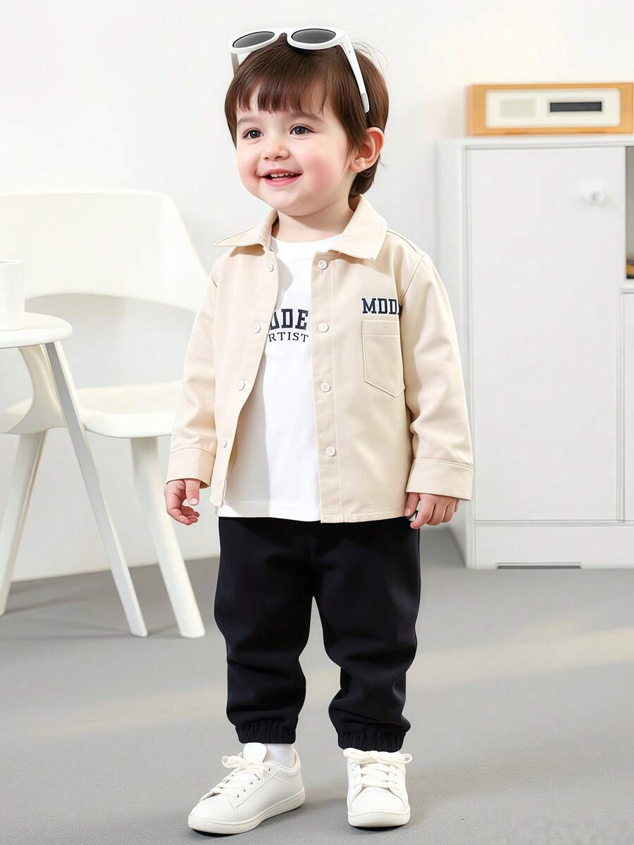 SHEIN Playful Pals 3 قطعة/طقم ملابس أطفال أولاد كاجوال على الطراز الكوري بقميص أبيض كم طويل، سترة مطبوع عليها حرف، وبنطلون طويل أسود، مناسبة للرياضة اليومية والأنشطة الخارجية، للربيع والصيف - متعدد الألوان - مشاهدة 1