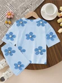 SHEIN Bộ đồ cho bé gái tuổi teen, gồm áo thun ngắn tay và quần short in hoa, kiểu dáng thoải mái, thời trang, dễ thương, thích hợp cho mùa xuân đến hè, màu xanh nhạt tươi mát. - Nhiều màu - Xem 2