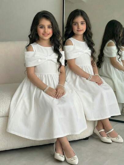 少女优雅露肩圆领蝴蝶结连衣裙