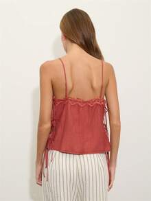 Nöista Terracotta Top With Ornate Lace Trim Along The Neckline And Center Panel. Adjustable Side Tie Details With Customizable Fit. Perfect For Date Nights, Spring, Summer, Holiday Vacation Look. - Coral Orange - View 2