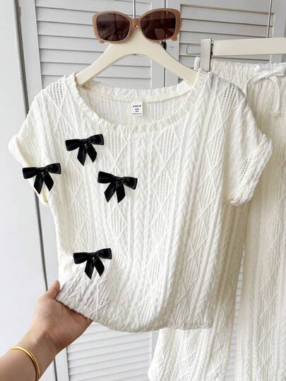 SHEIN Conjunto de camiseta de punto jacquard de manga corta y pantalones holgados, casuales y cómodos para niñas preadolescentes