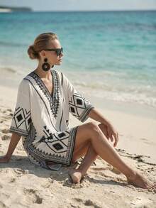 SHEIN Holidaya Đầm midi nữ mới năm 2026 với thiết kế xẻ tà in họa tiết, in kỹ thuật số, đầm đi biển thường ngày, thanh lịch, đa năng, cổ chữ V, dáng hình thoi, tay ngắn, đầm thường ngày cho nữ mùa hè, đầm tunic nữ, đầm tunic cho nữ, đầm nghỉ dưỡng cho nữ, trang phục đi nghỉ mát, trang phục nghỉ dưỡng cho nữ, trang phục phong cách nghỉ dưỡng, trang phục mùa xuân cho nữ, đầm mới về, đầm suông thường ngày cho mùa hè. - Nhiều màu - Xem 5