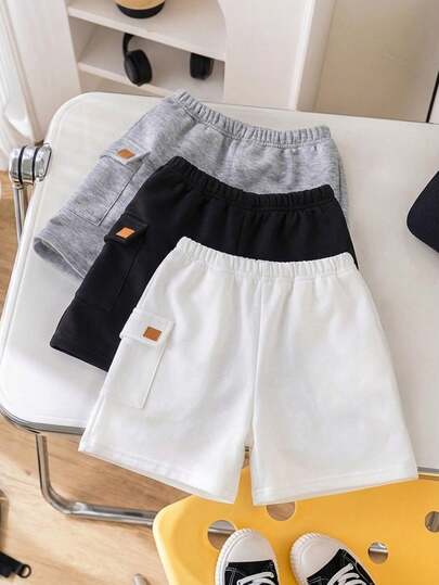 SHEIN 3pcs Young Boys' Casual Comfortable Pocket Decor Knit Shorts Set