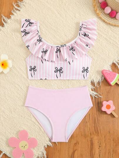 Traje de baño para niñas, con estampado de rayas verticales rosas y moños negros, conjunto de ropa de baño con volantes y tirantes cruzados, adecuado para vacaciones en la playa