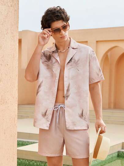 Manfinity VDAYZ Conjunto de camisa de manga corta y pantalones cortos con estampado de plantas tropicales para hombre, atuendo de playa