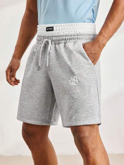 Driftmere Quần short nam dáng rộng, màu trơn, thiết kế in chữ ở cạp quần, phong cách thể thao đường phố.