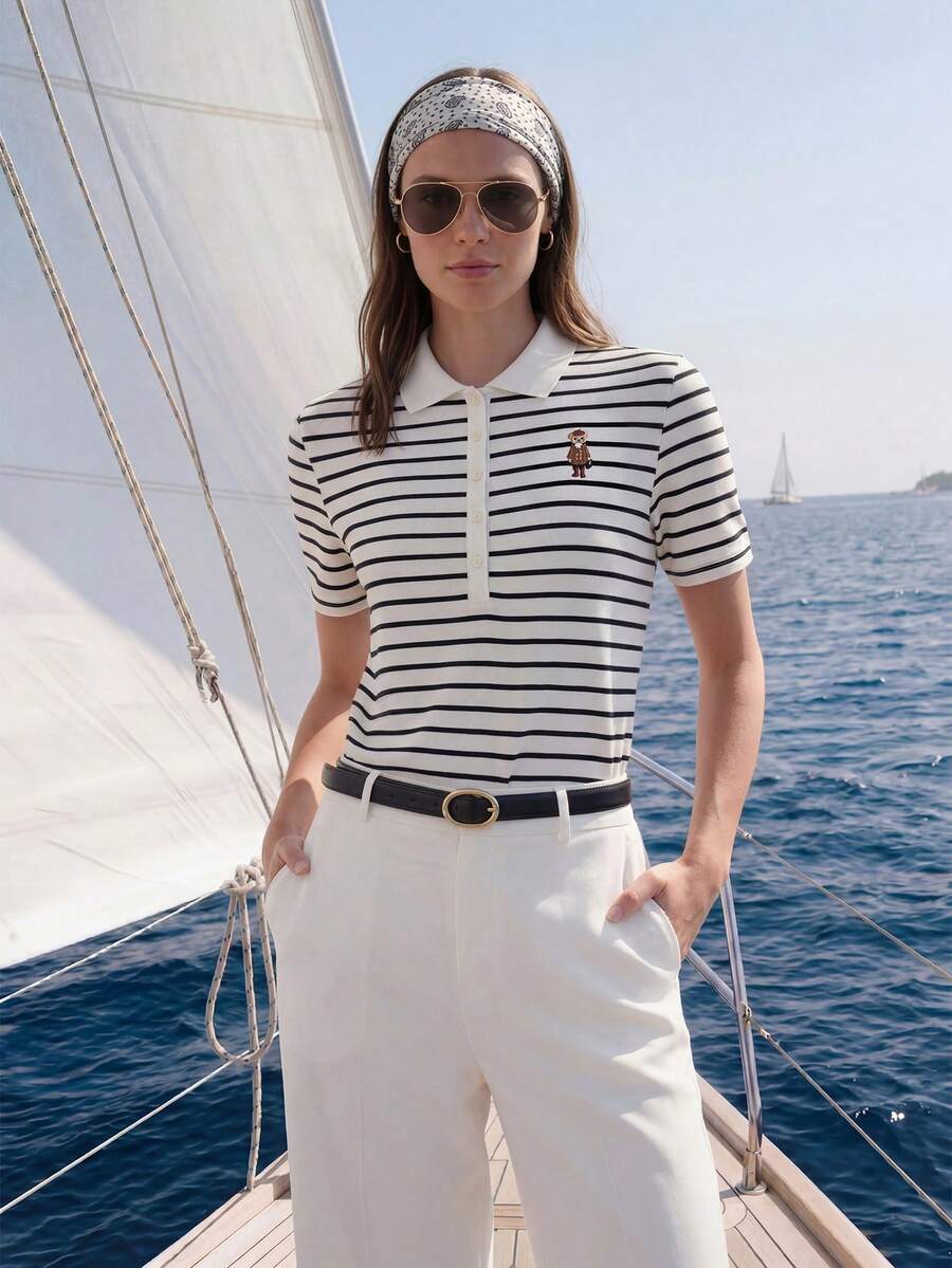 Briarwyn Áo Polo nữ tay ngắn kẻ sọc thêu hình hoạt hình, kiểu dáng thường ngày đa năng, thích hợp mặc đi làm, trang phục mùa hè cho nữ, trang phục mùa xuân cho nữ, trang phục nghỉ hè, trang phục ngày Valentine, trang phục ngày Thánh Patrick cho nữ, trang phục đi biển cho nữ, áo polo nữ để đi chơi, áo thun golf nữ, áo cao cấp nữ, trang phục hàng hải nữ, quần áo hàng hiệu nữ, áo tay ngắn nữ, áo sơ mi nữ mùa hè, áo công sở nữ. - Nhiều màu - Xem 1