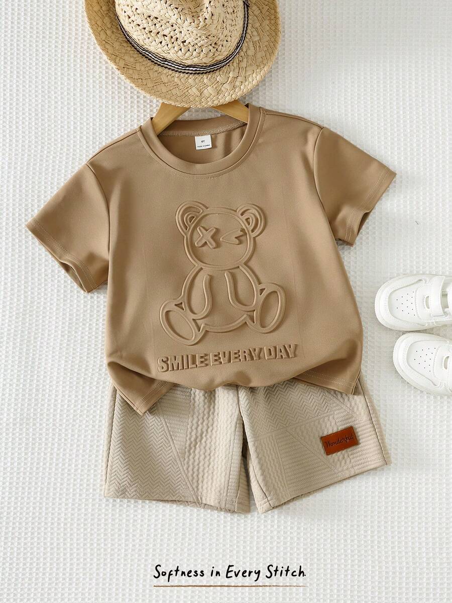 Cozy Pixies Bộ 2 món cho bé trai, gồm áo tay ngắn cổ tròn in hình gấu và quần short cạp chun, thích hợp cho các hoạt động giải trí, thể thao, dã ngoại, vui chơi, phong cách đường phố, tiệc tùng, kỳ nghỉ, bãi biển và nhiều dịp khác. - Nhiều màu - Xem 1