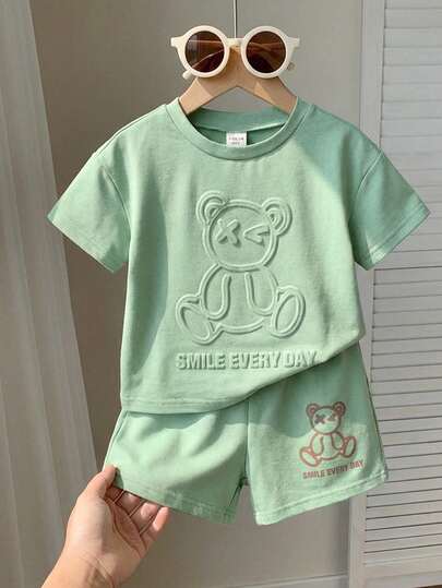 SHEIN 2pcs Baby Boy Cute Cartoon Pattern Jacquard Short Sleeve T-Shirt And Elastic Waist Shorts Set, Suitable For Spring And Summer Toddler Set Baby Short Sets