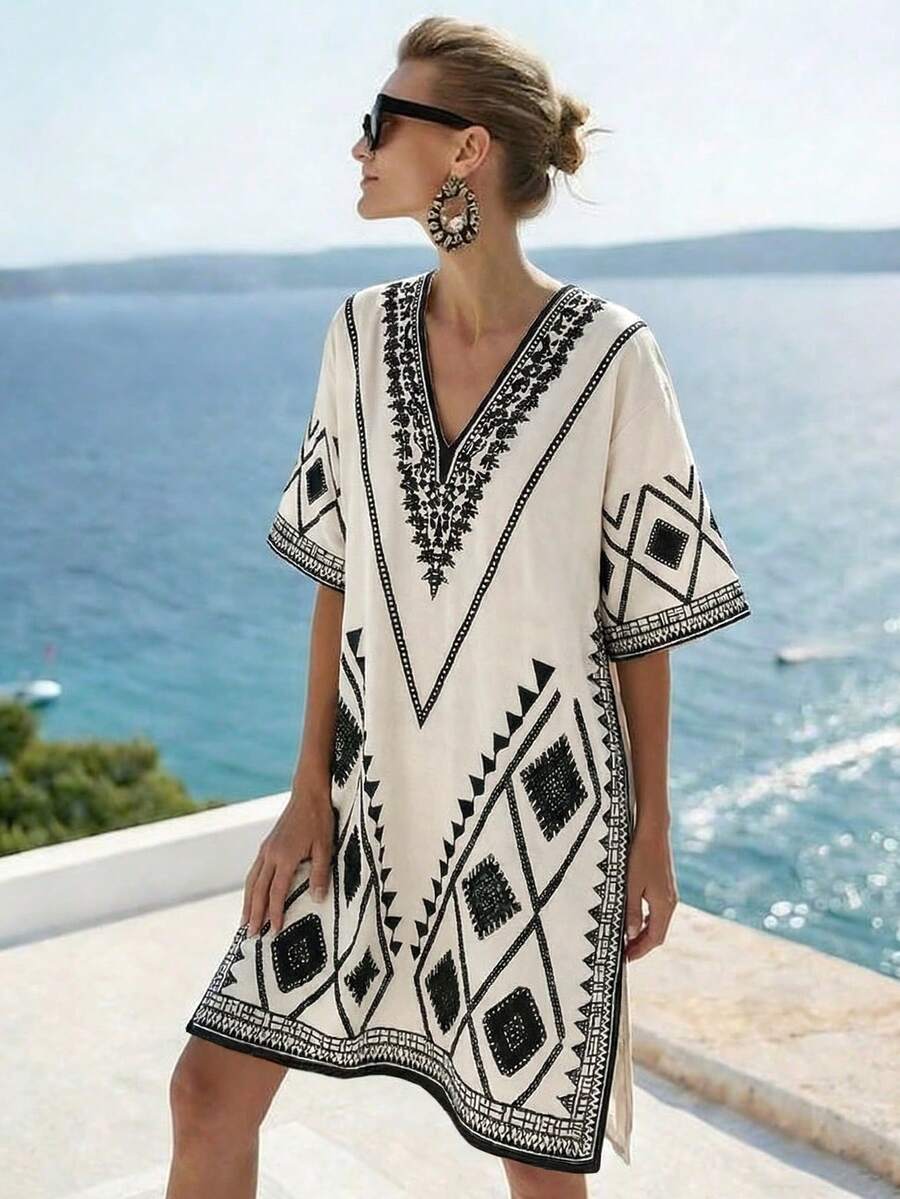 SHEIN Holidaya Đầm midi nữ mới năm 2026 với thiết kế xẻ tà in họa tiết, in kỹ thuật số, đầm đi biển thường ngày, thanh lịch, đa năng, cổ chữ V, dáng hình thoi, tay ngắn, đầm thường ngày cho nữ mùa hè, đầm tunic nữ, đầm tunic cho nữ, đầm nghỉ dưỡng cho nữ, trang phục đi nghỉ mát, trang phục nghỉ dưỡng cho nữ, trang phục phong cách nghỉ dưỡng, trang phục mùa xuân cho nữ, đầm mới về, đầm suông thường ngày cho mùa hè. - Nhiều màu - Xem 1