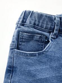 SHEIN Explorewe Quần jeans ống loe cạp cao kiểu retro màu xanh nhạt dành cho bé gái, thiết kế ôm sát với chun co giãn và gấu quần tua rua, phù hợp cho những buổi đi chơi thường ngày và hoạt động ngoài trời. - Rửa trung bình - Xem 6