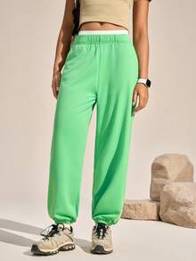 Exploreva Pantalones jogger para mujer con cintura elástica, bolsillos en diagonal y ribete de contraste - Verde - Ver 2