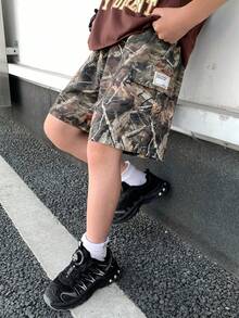 SHEIN 3件組青少年男孩寬鬆休閒梭織短褲多色套裝，純色基礎工裝風，深綠色，適合夏季休閒與登山，適用春夏兩季 - 軍綠色 - 查看 11