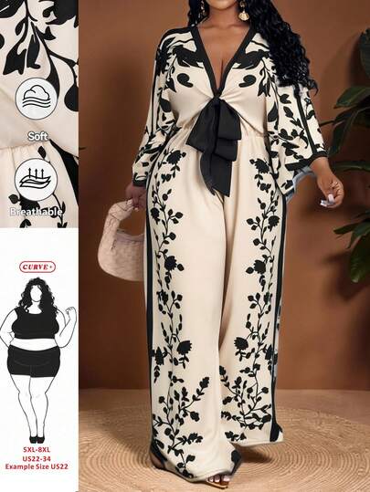 SHEIN CURVE+ Mono de pierna ancha con estampado floral, cuello en V profundo, mangas de murciélago y lazo delantero, estilo sexy de vacaciones, para mujeres de talla grande, primavera/otoño, transpirable