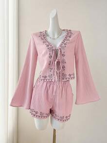 Set de 2 piezas: Top de manga larga con cuello en V bordado y detalle de torsión en color albaricoque claro, y shorts con bolsillos en diagonal - Rosa Pálido - Ver 4