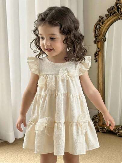 SHEIN Vintaside Kids 女婴田园风连衣裙，面料柔软，饰有蝴蝶结，荷叶袖，可爱时尚，适合春夏穿着