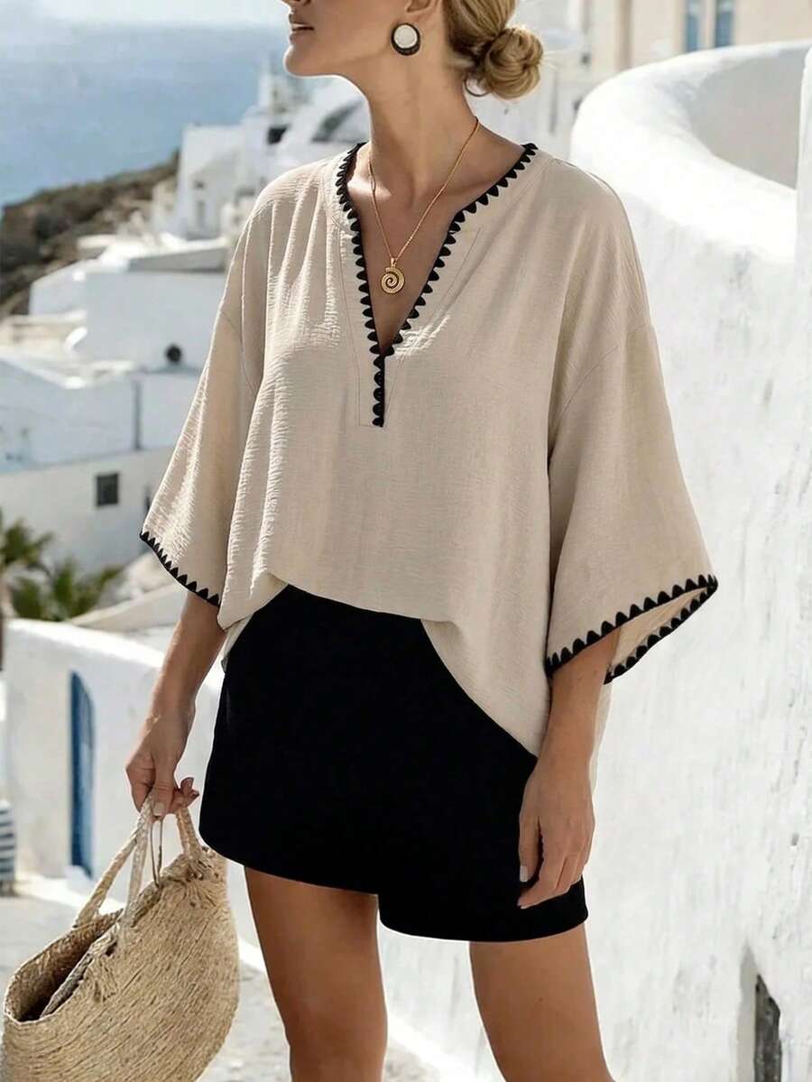 SHEIN Holidaya Áo kiểu nữ mùa xuân/hè mới, phong cách retro, thoải mái, rộng rãi, tay cánh dơi, thêu họa tiết tương phản, cổ chữ V, tay lửng 3/4, thích hợp mặc mùa xuân/hè, áo sơ mi thường ngày, áo thêu tương phản, áo mùa hè, thích hợp mặc đi nghỉ mát, mặc hàng ngày, thời trang đa năng. - Màu be - Xem 1