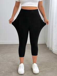 Enliva Plus Size Casual Solid Color High Waisted Side Pocket Capri Leggings Plus Size Pants For Women, For Apple And Rounded Body Shape - Black - View 7