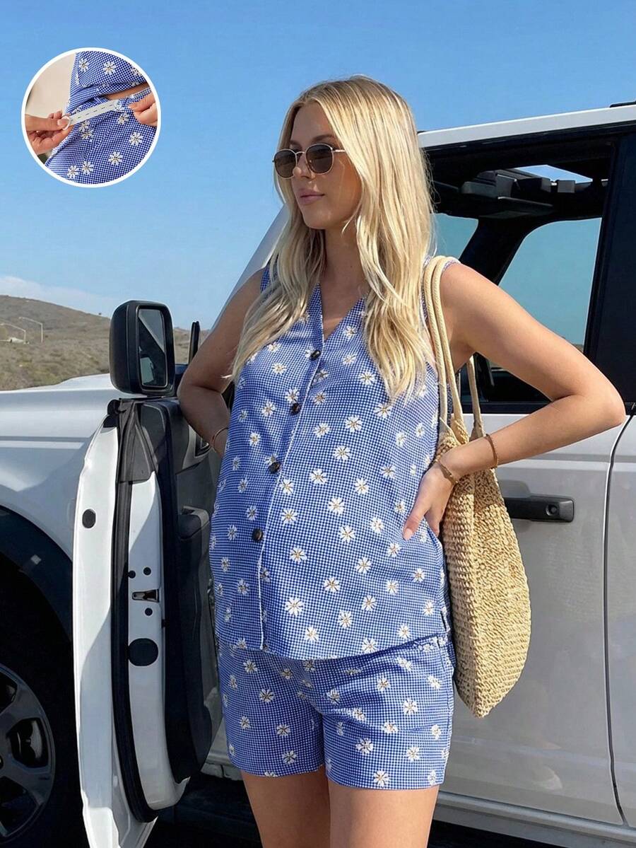 SHEIN Conjunto de 2 piezas de top sin mangas con botones y estampado de margaritas, y shorts con cintura ajustable, estilo de vacaciones en la playa para embarazadas - Azul - Ver 1