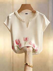 GlowEve Camiseta de mujer de manga corta con cuello en V elegante, estampado de tulipanes y cuentas - Albaricoque - Ver 1