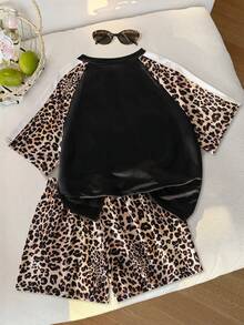 SHEIN Bộ áo thun ngắn tay và quần short phối màu cho bé gái tuổi teen, kiểu dáng thể thao, màu hồng và xanh đậm, thiết kế rộng rãi và ôm sát, chất liệu nhẹ, phù hợp cho mặc hàng ngày, chơi thể thao hoặc phối đồ. - màu nâu - Xem 2