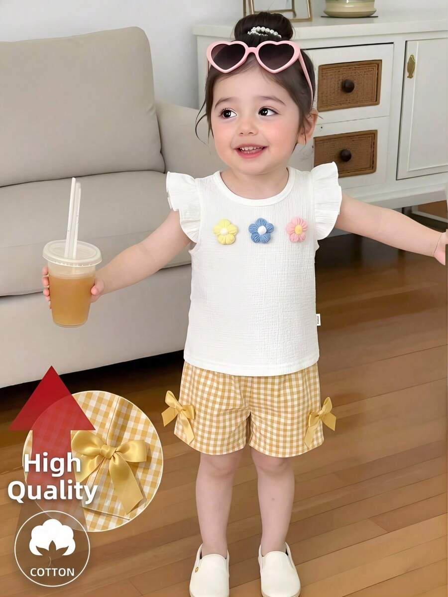 SHEIN Set di maglietta a maniche corte con fiori 3D e pantaloncini a quadri per bambine - Giallo - Visualizzare 1