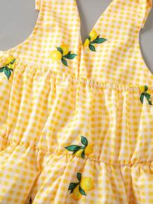 SHEIN Elladie kids Bộ váy màu vàng kẻ caro rực rỡ với họa tiết chanh tươi tắn, sống động và bắt mắt. Thiết kế cổ áo có ve, thanh lịch và năng động, cài cúc phía trước dễ mặc. Eo thon kết hợp với chân váy chữ A, tạo dáng thon gọn và thoải mái khi vận động. Thích hợp cho những buổi đi chơi hàng ngày hoặc dã ngoại, biến bé yêu của bạn thành một tia nắng ngọt ngào, tràn đầy năng lượng tích cực. - Màu vàng - Xem 7