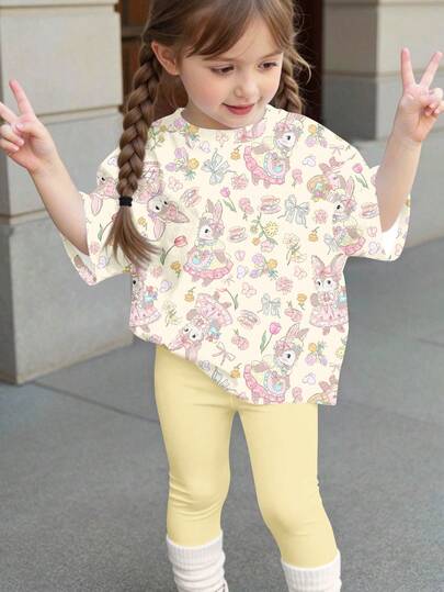 SHEIN Bộ áo thun ngắn tay cổ tròn dáng rộng thoải mái và quần legging in hình thỏ đồng quê dễ thương cho bé gái, thích hợp cho mùa xuân/hè.
