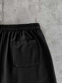 AXEPEAK Quần short nam in hình Chúa Giêsu Thánh Tâm, cạp chun có dây rút và túi hai bên. - màu đen - Xem 5